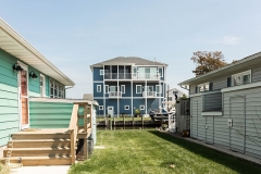 viwinco-exterior-new-construction-patio-doors-picture-windows-doublehung-windows-mulled-windows-circle-window-flat-casing-flat-grids-white-windows