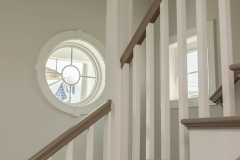 viwinco-staircase-new-construction-circle-window-casement-window-flat-internal-grids-white-windows