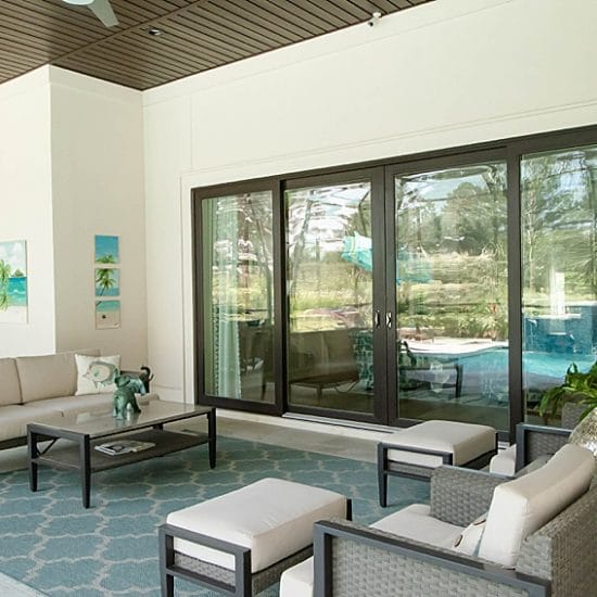 Bronze-finish Viwinco OceanView Impact Resistant windows installed in Alabama home.