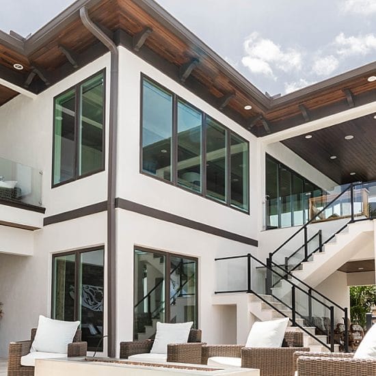 Viwinco OceanView windows with bronze finish laminate installed in waterfront home.