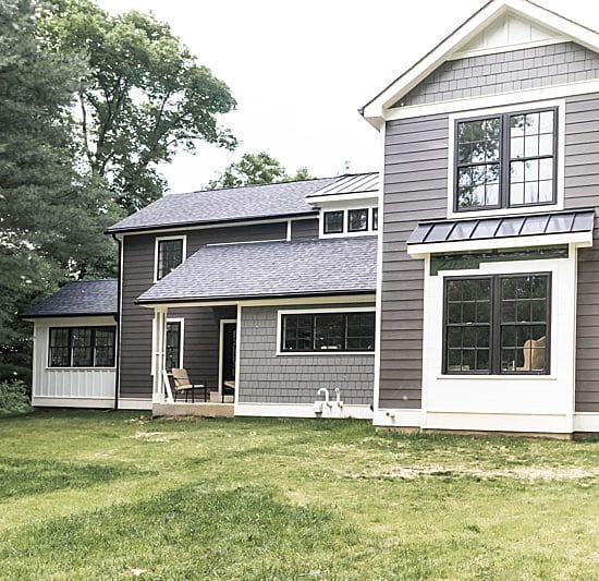 Black New Construction Viwinco windows installed in home.