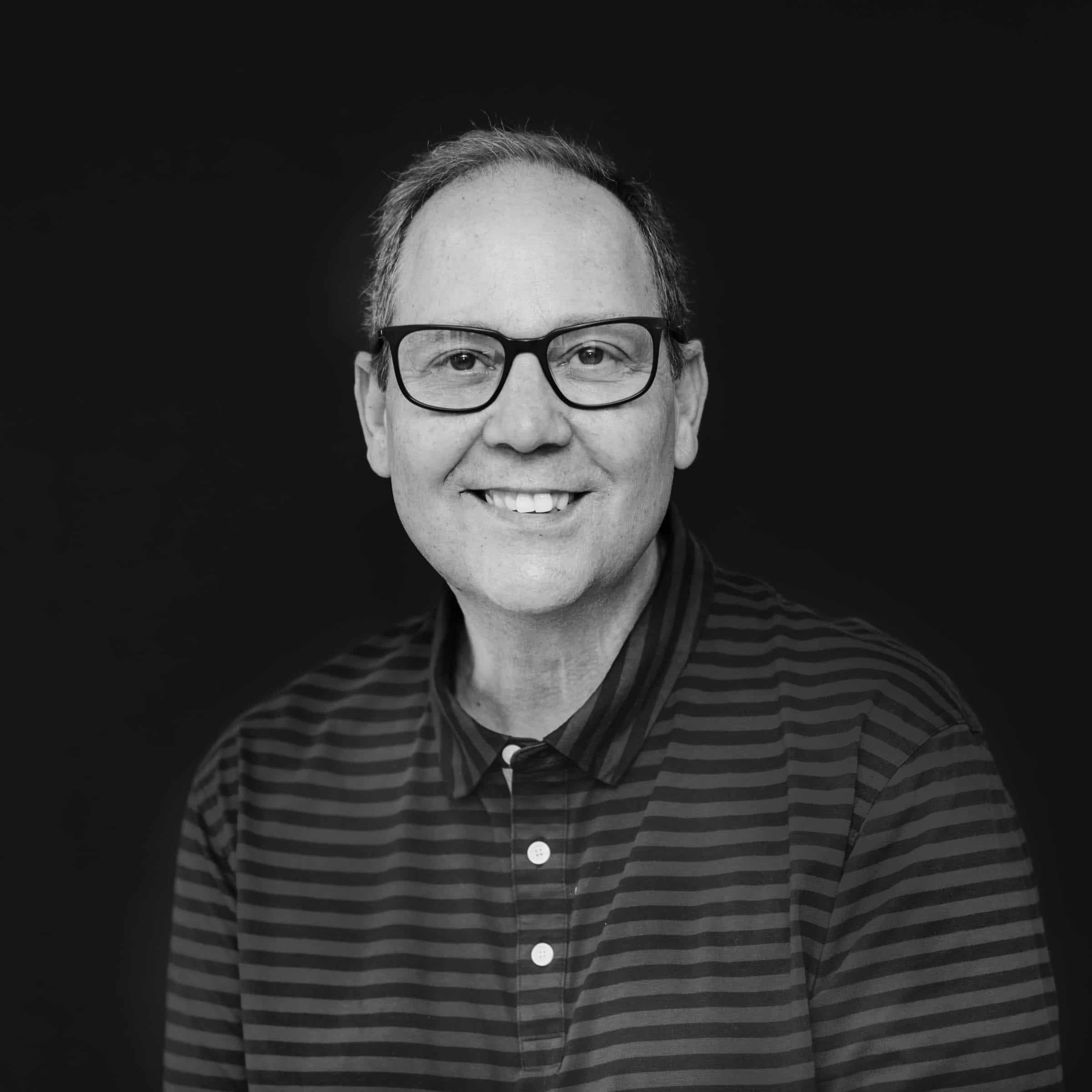Black and white portrait of Viwinco employee, Lou.