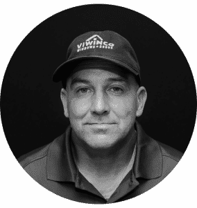 Black and white portrait of team member, Henry.