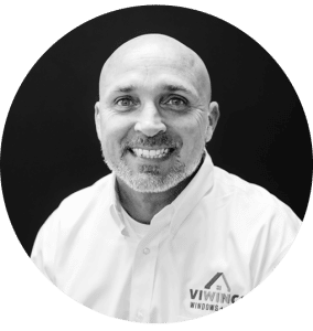 Black and white portrait of team member, Colin.