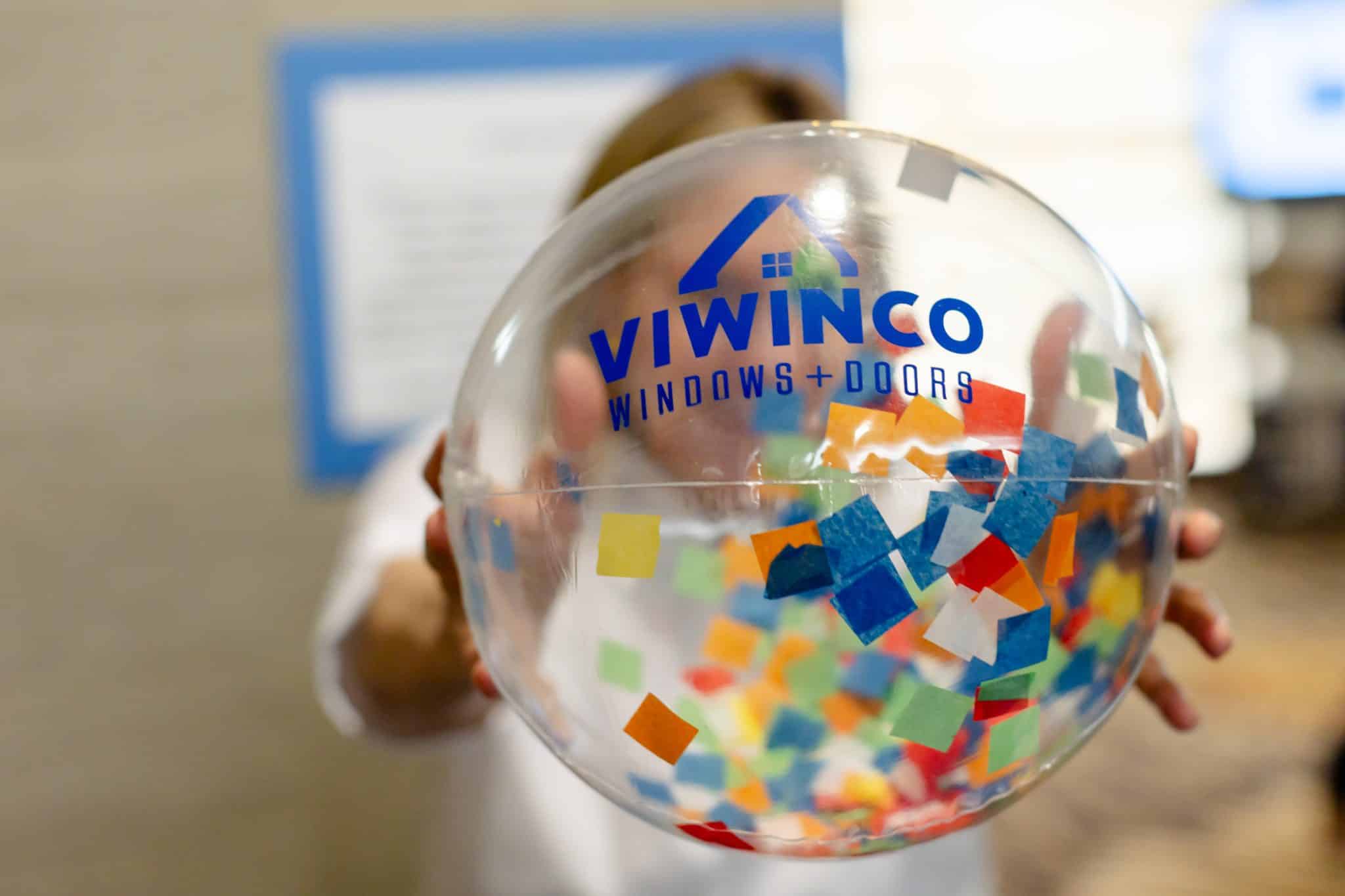 WhatsSoCool-2024-9 Woman holding Viwinco branded beachball